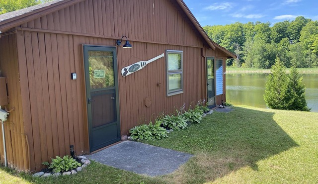 Peaceful cabin with Black River frontage in Northern Michigan!