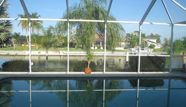 Peaceful, canal home in desirable Punta Gorda Isles. Walk to Fishermen's Village