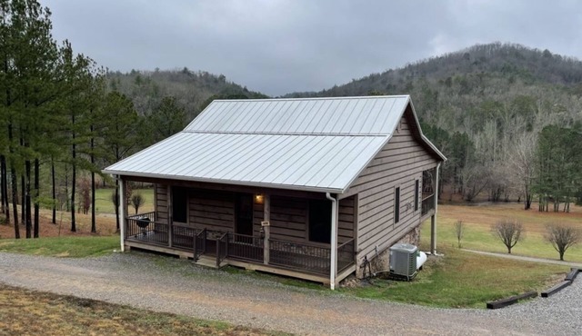 Peaceful family cabin near fishing with over 100 acres of mountain and field trails to explore! by RedAwning