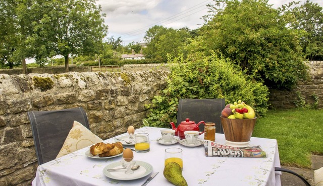 Peaceful farm cottage with beams and log burner