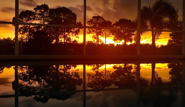 Peaceful fresh water canal home with heated pool. Incredible Value.