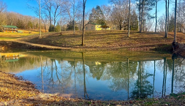 Peaceful Hills Retreat’s cottage is clean and cozy with a creek on 97 acres