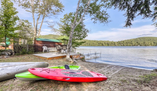 Peaceful lakefront house with private dock and sandy beach