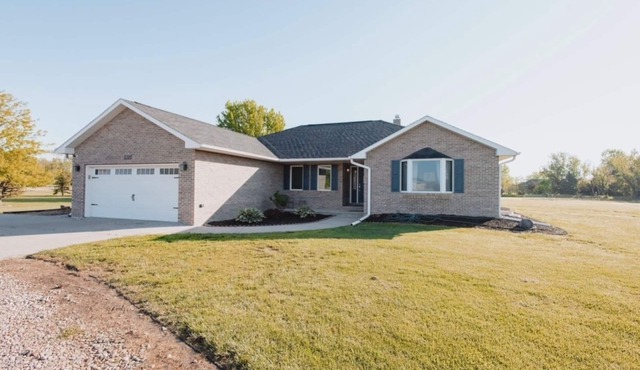 Peaceful neighborhood OUTSIDE of Kearney and one of the LARGEST homes available.
