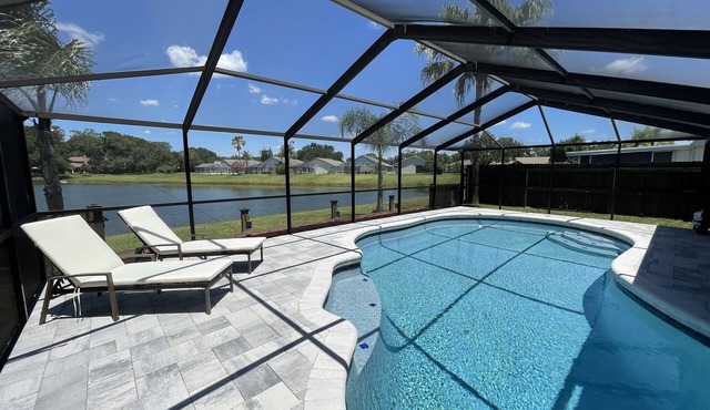 Peaceful Poolside Lake Home 15 Mins to Tampa