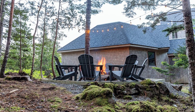 Peaceful private woodland home, open and airy, with ocean views and fire pit