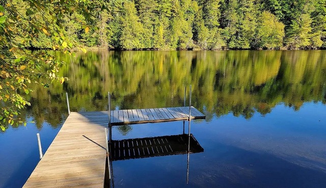 Peaceful riverside retreat nestled along the picturesque Wolf River
