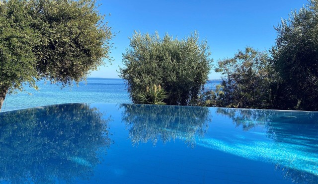 Peaceful Seafront Villa with Infinity Pool & Sea Access – Sleeps 12