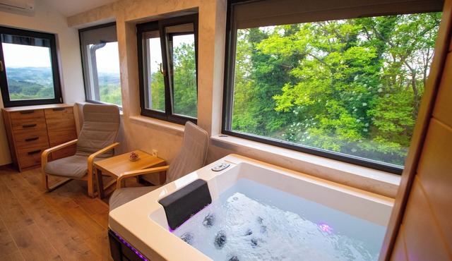 Peaceful vineyard house with jacuzzi and sauna for relaxation.