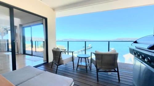 Peaceful Waterfront Retreat with Private Jetty Near Train