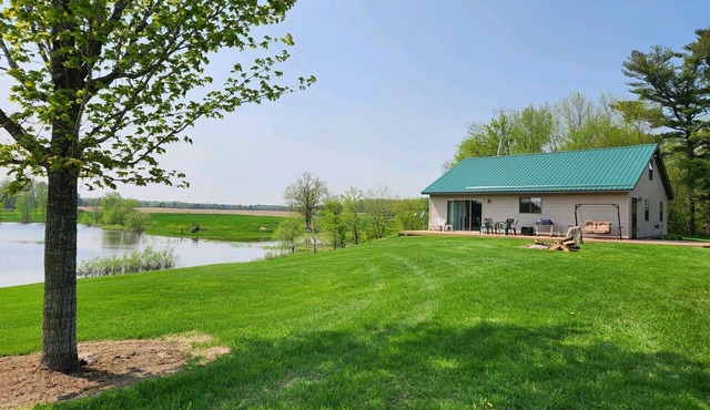 Peacefully secluded cabin on a small private lake with 55 Acres
