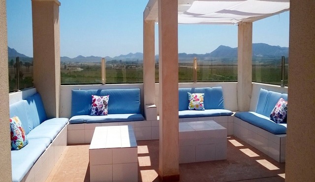 Penthouse apartment with roof terrace, communal pool, sea views