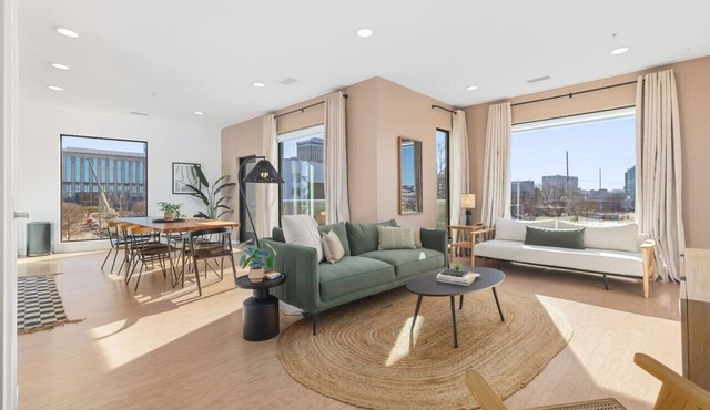 Penthouse on River with Garage and Patio, Walk to Downtown
