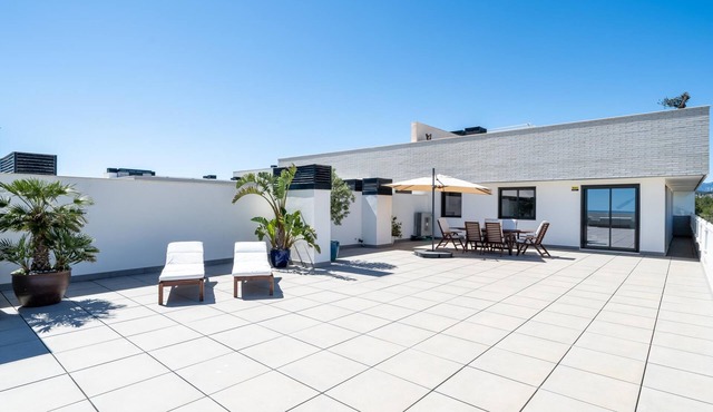 Penthouse with private solarium and pool sea views