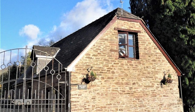 Penybont Barn a cosy riverside barn conversion in Llangorse, the Brecon Beacons
