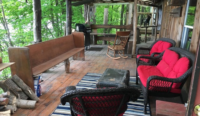 Perched over private beach on Cayuga Lake