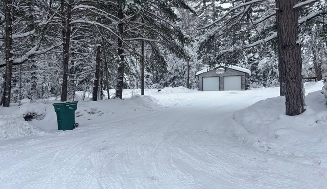 Perfect 4-bedroom house in Frederic for your next getaway. Plenty of parking!