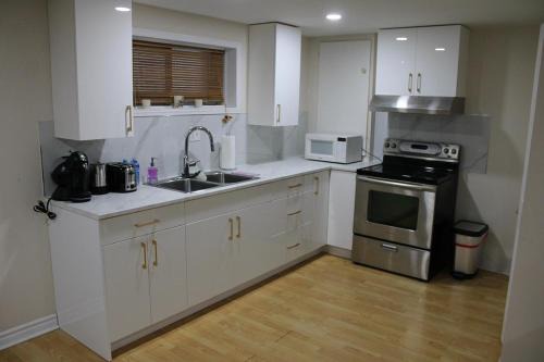 Perfect location brand new basement 1 bedroom full basement with kitchen in unit laundry separated