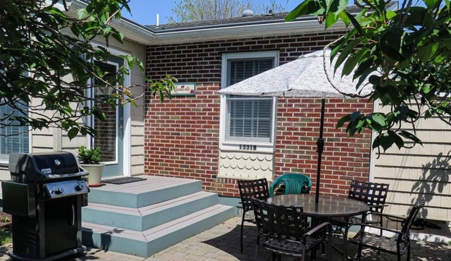 Perfectly Appointed Village Green Quad