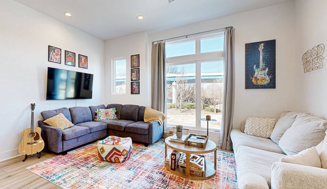Perfectly located home with private rooftop deck, grill, & four primary suites