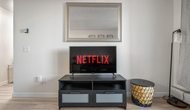 Perfectly Located, Peaceful Downtown Condo Steps to the Bow River