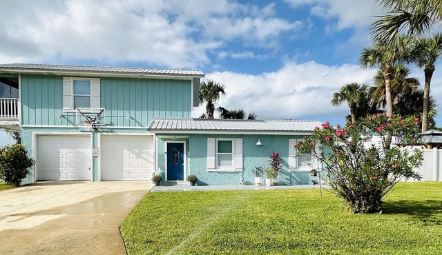 Pet friendly beach home across the street from marina and restaurant!