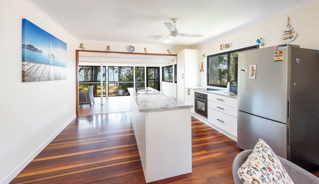 Pet friendly beachfront home in Hervey Bay. Sleeps 8. Pets are allowed inside
