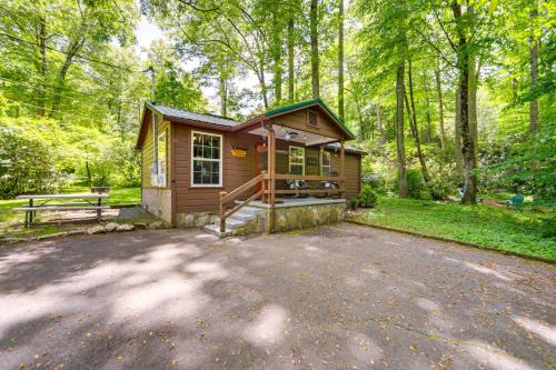 Pet-Friendly Creekside Cabin with Pool Access!