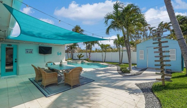 Pet friendly house with a heated pool and hot tub!