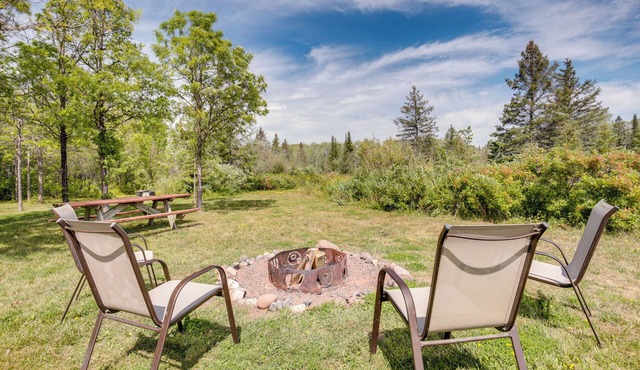 Pet-Friendly Iron River Cabin with Fire Pit!