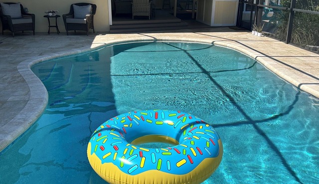 Pet-Friendly luxe pool home with private dock.