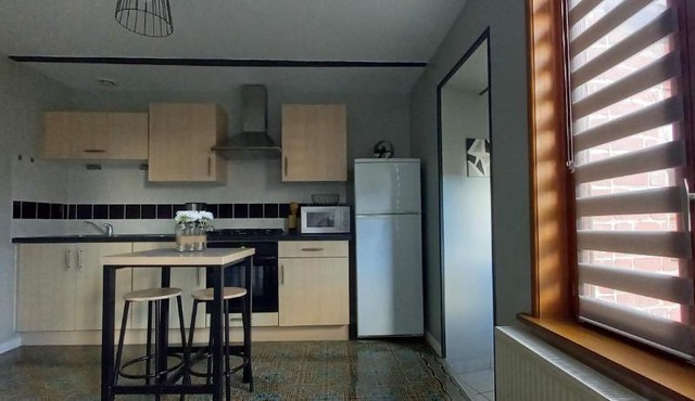 Petite maison avec petit jardin privé