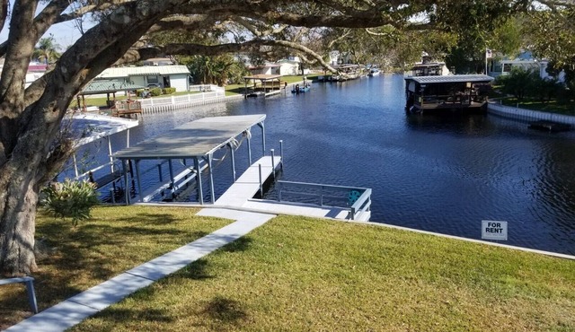 PETS STAY FREE Canal Front 3 bed/2 bath single family ample parking