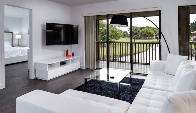 PGA National Home on Squire Golf Course 180º Water Views by Guaranteed Rental™