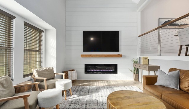 Picture perfect modern farmhouse getaway on enchanting 7 acres in Holt