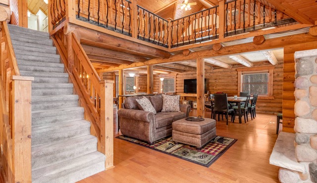 Picturesque dog-friendly cabin with firepit, pool table, deck, yard, & fireplace