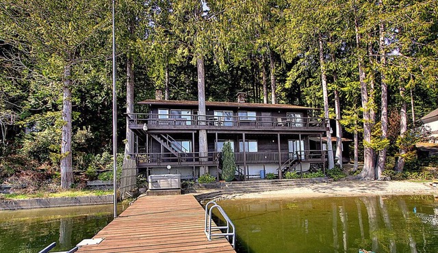 Picturesque Mason Lake Waterfront with Private Dock and Beach