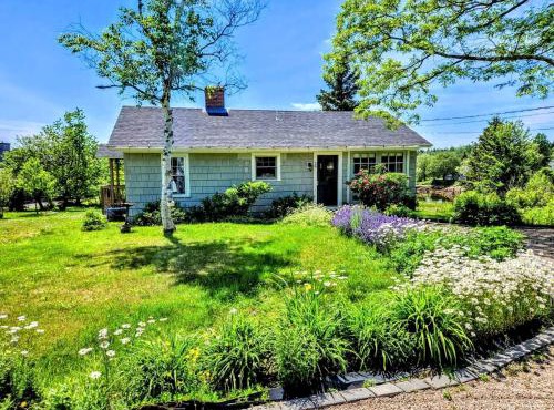 Picturesque Waterfront Cottage with Waterfall Views, Fireplace & Deck, Near Acadia National Park in Gouldsboro, Maine