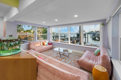 Pink Pony Villa - Waterfront Escape with Pool & Themed Rooms