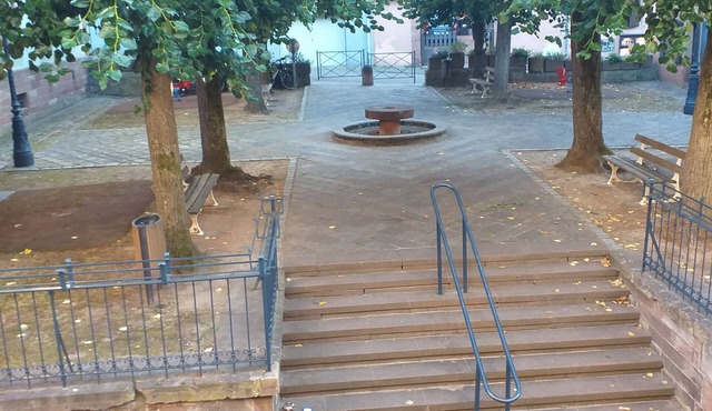 "Place Monet", a pretty, tree-lined square in the center of town.
