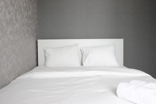 Pleasant and Homey 2BR Apartment at Tamansari La Grande By Travelio