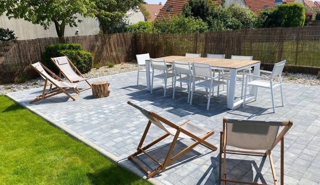 Pleasant house in quiet neighborhood with garage and fenced garden.