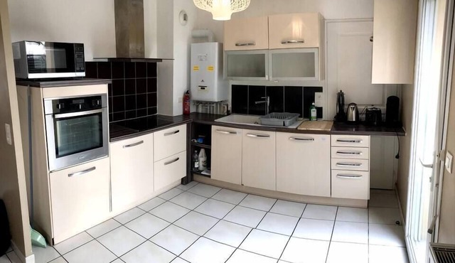 Pleasant house near train station with free parking