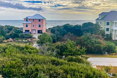 Pleasant ocean view home with balcony, rocking chairs, soaking tub, AC, & W/D