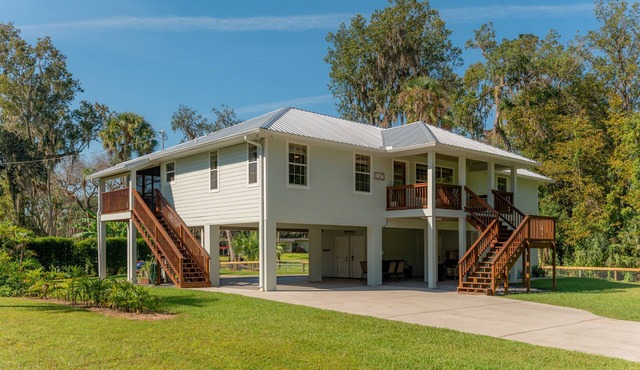 Pleasant Point, a blue spring waterfront home on Kings Bay in Crystal River, Fl.