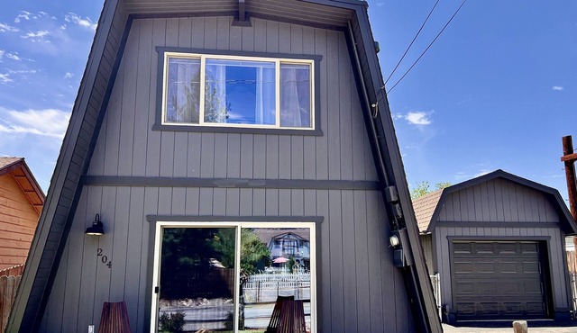 Plug in to the peace, joy, and Zen at this modern Modified A-Frame Cabin!
