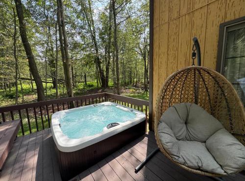 Pocono Nest Family Home with Hot Tub Deck Sunroom Pool Big Bass Lake Larsen Lake Gouldsboro Clifton Township