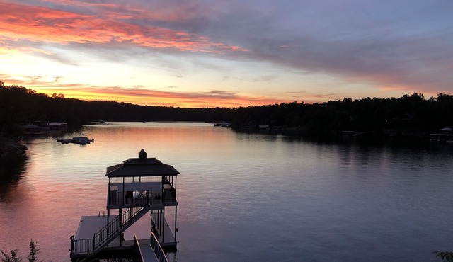 Point lot w/beautiful views! Deep water, 2-story dock, min steps to water.