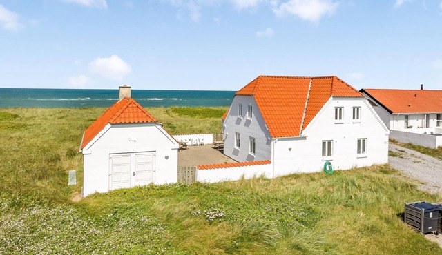Pool and activity house with a fantastic view of the North Sea.