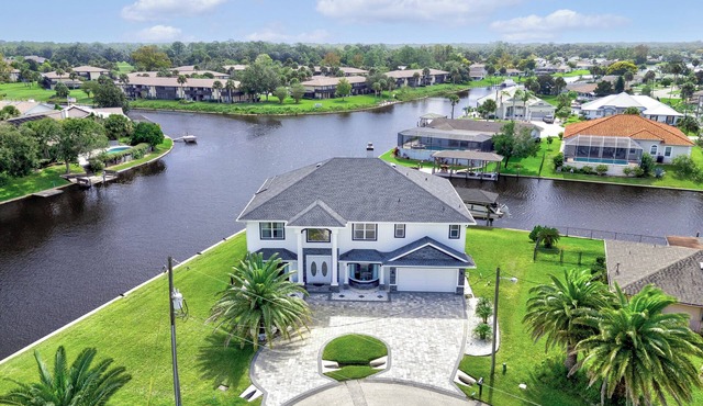 Pool and canal front home in Palm Coast!